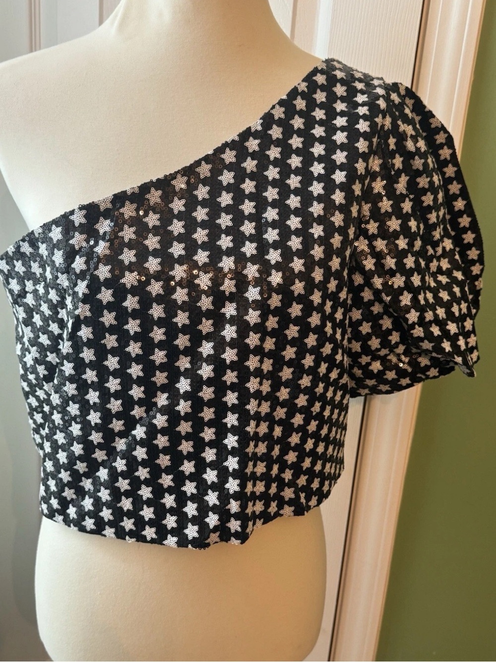 Queen of sparkles one shouldered star top
